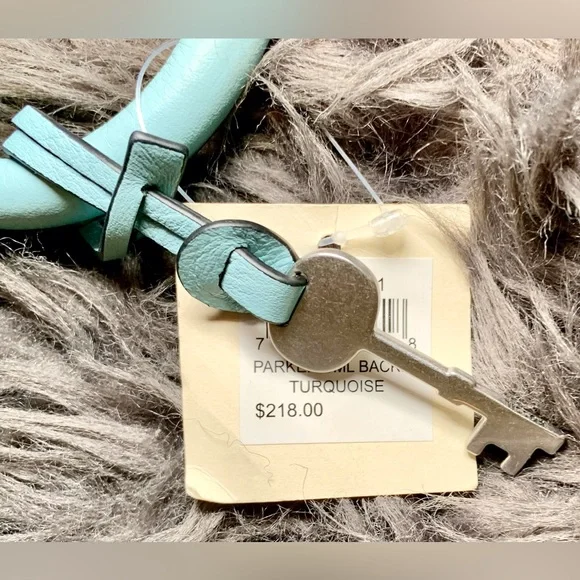 Sold🚨Fossil Turquoise Ice Parker Laptop Back pack w/ top Handle & Fringe design - Picture 13 of 13